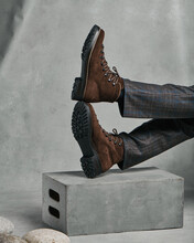 Mens Boots On A Gray Background 