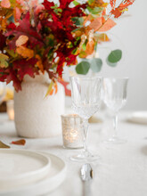 Fall Decor Table Setting With Foraged Leaves