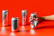 © Heng Yu/Stocksy - crumple an aluminum can with one hand