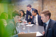 © KOTO - Business people talking in conference room meeting