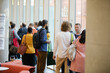 © KOTO - People talking in hall of auditorium