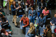 © KOTO - Conference audience watching speakers on stage