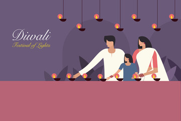 Wall Mural - A family decorating their home with Diwali oil lamps.Concept for Diwali festival in India