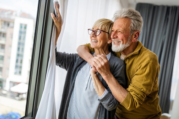 Wall Mural - Cheerful senior couple enjoying life and spending time together