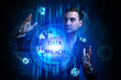 © Egor - Business, Technology, Internet and network concept. Young businessman working on a virtual screen of the future and sees the inscription: Data breach