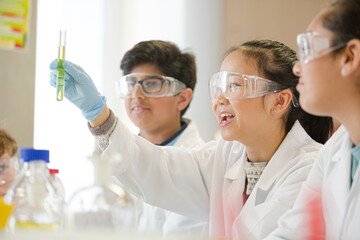 Wall Mural - students conducting scientific experiment in laboratory classroom