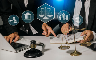 Concepts of Law and Legal services. Lawyer working with law interface icons. Blurred background.	