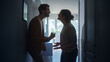 © Gorodenkoff - Young Couple Arguing and Fighting. Domestic Violence and Emotional abuse Scene, Stressed Woman and aggressive Man Screaming at Each other in the Dark Hallway of Apartment. Dramatic Scene