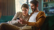 © Gorodenkoff - Couple Use Smartphone Device, while Sitting on a Couch in the Cozy Apartment. Boyfriend and Girlfriend Shopping on Internet, Watching Funny Videos, Use Social Media, Streaming Service.