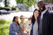 © KOTO - Portrait smiling, affectionate young couple hugging in sunny park