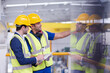 © KOTO - Supervisor and worker talking in steel factory