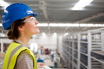 Wall Mural - Portrait confident female supervisor in steel factory