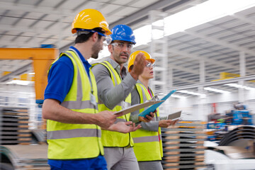 Wall Mural - Supervisor and workers talking in warehouse