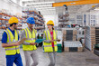 © KOTO - Supervisor and workers talking in warehouse