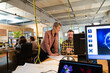 © KOTO - Man and woman discussing paperwork at desk