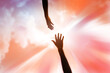 religious arm of human held up high in the sky to ask for rescue and forgiveness of god and gets a helping hand hold out to hoping christian to protect the believer