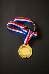Wall Mural - Gold medal. Champion trophy award and ribbon. Prize in sport for