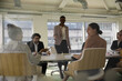 © KOTO - Business people in conference room meeting