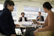 © KOTO - Business people in conference room meeting