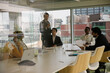 © KOTO - Businessman leading conference room meeting