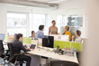 © KOTO - Business people meeting in open plan office