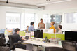 © KOTO - Business people meeting in open plan office