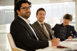 © KOTO - Businessmen talking in conference room