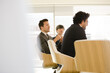© KOTO - Businessmen in conference room meeting