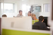 © KOTO - Business people brainstorming in open plan office