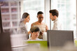 © KOTO - Business people talking in open plan office