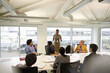 © KOTO - Businesswoman leading conference room meeting