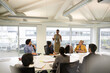 © KOTO - Businesswoman leading conference room meeting