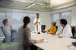© KOTO - Businesswoman leading conference room meeting