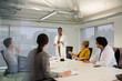 © KOTO - Businesswoman leading conference room meeting