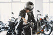 © prostooleh - Handsome man choosing a motorcycle to buy