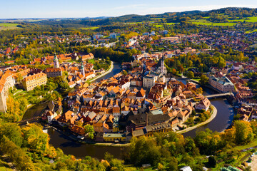 Wall Mural - Aerial landscape of small czech town of Cesky Krumlov and Vltava river in autumn day