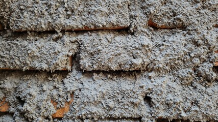 Dark gray concrete wall texture and bricks for background