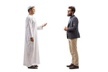 full length profile shot of a man in ethnic clothes talking to a casual bearded man