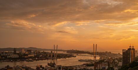 Fototapete - City skyline at the sunset. Golden hour.