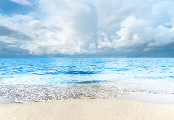 Wall Mural - Empty beach tropical sea and beautiful cloudy sky