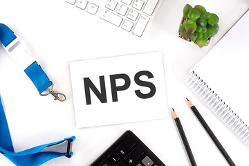 Poster - NPS Words on the card with keyboard and office tools