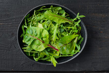 Arugula Raab And Mangold, Swiss Chard Set, On Black Wooden Table Background, Top View Flat Lay