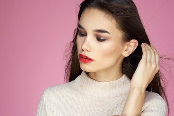 Wall Mural - brunette with red lips in white sweater cosmetics lifestyle isolated background