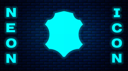 Sticker - Glowing neon Leather icon isolated on brick wall background. Vector