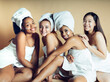 © PintoArt - beautiful multiethnic women, Asian, African,   and redhead, with body towel beauty and spa treatment