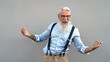 © Alessandro Biascioli - Happy senior man celebrating and laughing in front camera - Fashion elderly male lifestyle concept