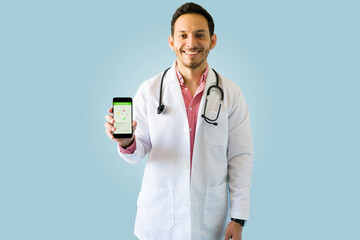 Wall Mural - Nutritionist using a health app on his phone