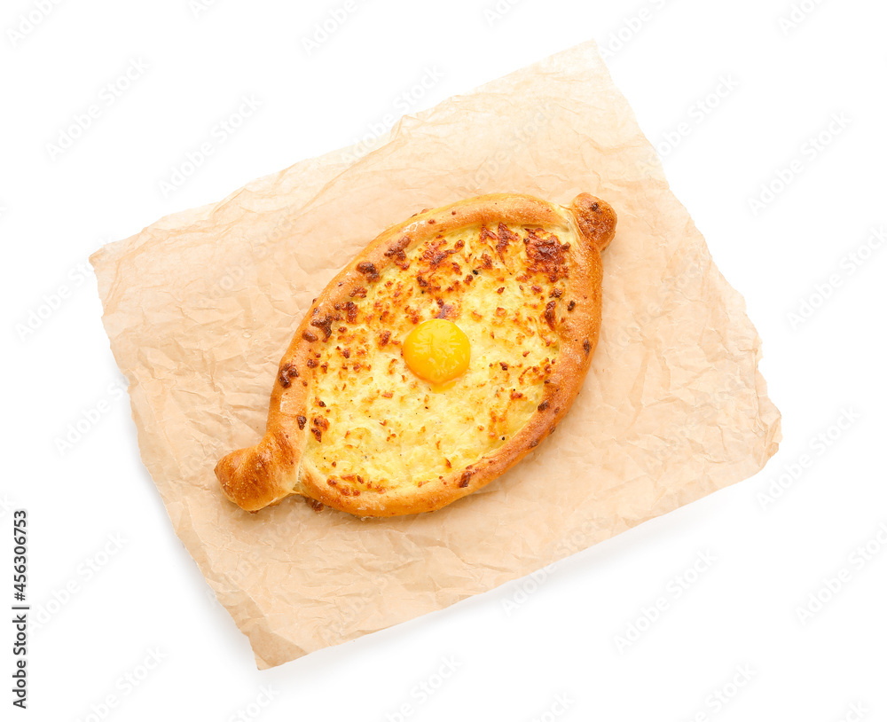 Tasty Ajarian khachapuri on white background