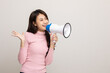 © Chanakon - Shout out loud with megaphone. Young beautiful asian woman woman announces with a voice about promotions and advertisements for products at a discounted price. Shopping and fashion concept.