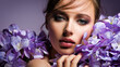 © Valua Vitaly - Pretty woman with bright makeup. Beautiful white girl with flowers. Stunning brunette girl with big bouquet  of hydrangeas. Closeup face of young beautiful woman with a healthy clean skin.